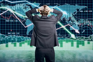 Foto: Mann vor Chart